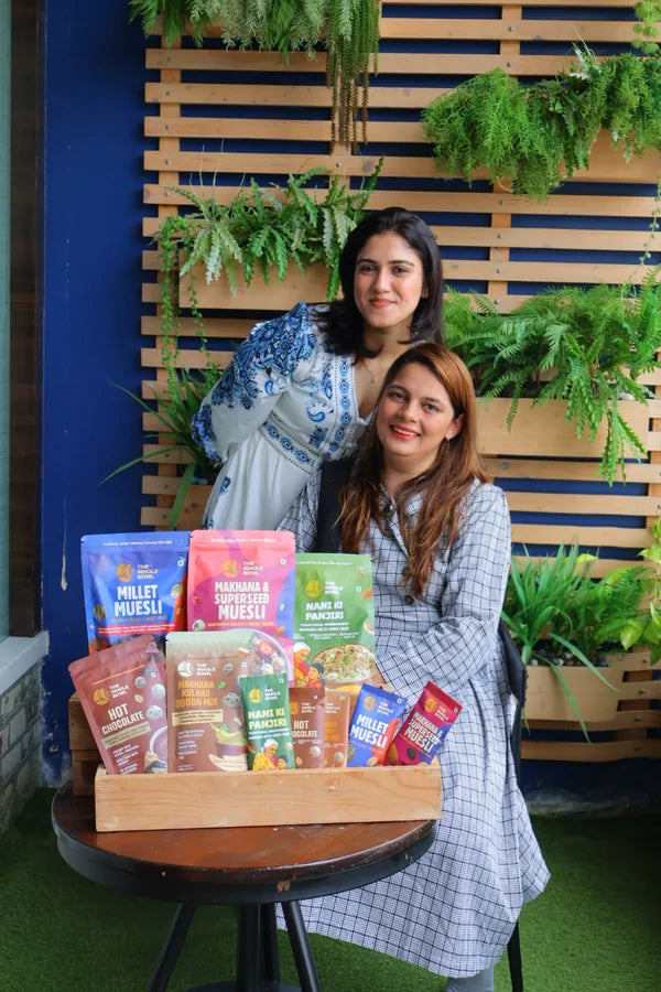 Simran and Talat, the founders, with the full The Whole Bowl range