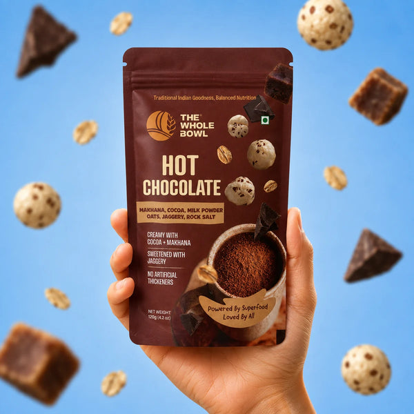 A hand holding the Hot Chocolate pouch