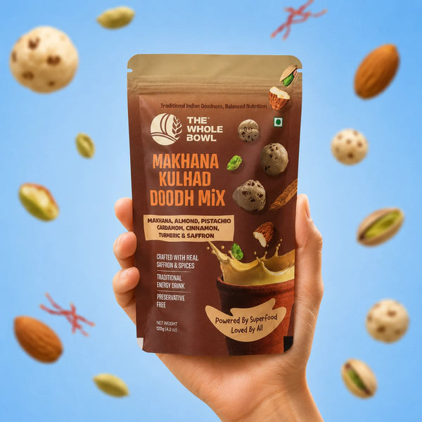 A hand holding the Makhana Kulhad Doodh Mix pouch